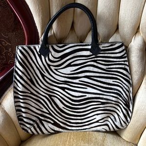 Maurizio Taiuti genuine leather, made in Italy.